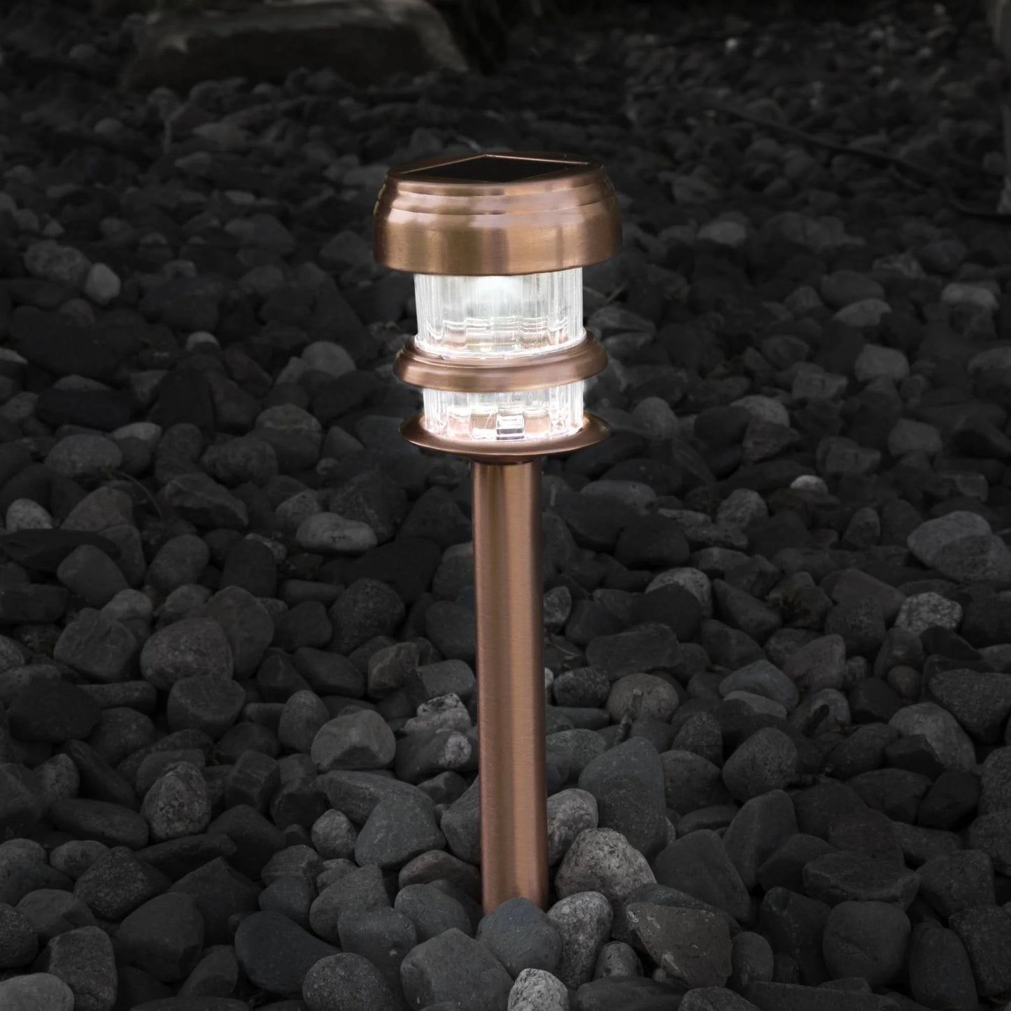 Solar Powered Lights (Set of 4)- LED Outdoor Stake Spotlight Fixture for Gardens, Pathways, and Patios by -Copper